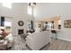 Spacious living room with a fireplace, soaring ceilings, and an open-concept design at 62 Faircox Way # 139, Garner, NC 27529