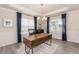 Comfortable home office with a large desk and natural light at 62 Faircox Way # 139, Garner, NC 27529