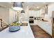 Sleek kitchen island with quartz countertops and double sink at 625 Bronco Cir, Durham, NC 27703