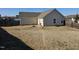 Large backyard with a patio and wooden fence at 670 Meadowtop Cir, Burlington, NC 27217
