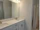 Bathroom with double vanity, quartz countertops, modern fixtures, and bright lighting for a fresh feel at 71 Priming Way, Angier, NC 27501