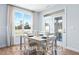 Cozy dining area with large windows and access to the patio, perfect for indoor/outdoor dining at 71 Priming Way, Angier, NC 27501