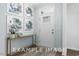 Bright entryway with elegant decor and a stylish console table under decorative prints at 71 Priming Way, Angier, NC 27501