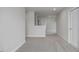 A bright and open carpeted hallway with white walls and trim at 71 Priming Way, Angier, NC 27501