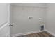 A utility space features sleek laminate flooring and ample shelving at 71 Priming Way, Angier, NC 27501