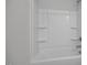 Modern bathroom featuring a white tub and shower combination at 71 Priming Way, Angier, NC 27501