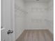 Bright walk-in closet with wire shelving, offering ample storage space and organization at 71 Priming Way, Angier, NC 27501