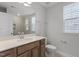 Bathroom with stylish vanity, updated hardware, modern fixtures and framed mirror at 720 Georgias Landing Pkwy # 11, Raleigh, NC 27603