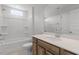 Bathroom featuring a tub/shower combo, white countertops, and a large mirror at 720 Georgias Landing Pkwy # 11, Raleigh, NC 27603