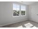 Sunny bedroom with new carpet, white walls and 2 windows, letting in natural light at 720 Georgias Landing Pkwy # 11, Raleigh, NC 27603