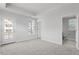 This airy room has neutral carpet and walls, walkout, and is next to a bathroom at 720 Georgias Landing Pkwy # 11, Raleigh, NC 27603