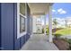 Side view of a charming home with a covered walkway and tasteful landscaping at 720 Georgias Landing Pkwy # 11, Raleigh, NC 27603