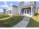 Backyard exterior showcasing patio, landscaping, and neighborhood homes at 720 Georgias Landing Pkwy # 11, Raleigh, NC 27603