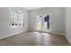 Bright living room with lovely floors, neutral paint and walkout to the backyard at 720 Georgias Landing Pkwy # 11, Raleigh, NC 27603
