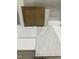 Samples showing the cabinets, flooring and countertop options for kitchen design at 720 Georgias Landing Pkwy # 11, Raleigh, NC 27603