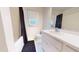 Simple bathroom with a bathtub and single vanity at 7607 Divot Dr, Sanford, NC 27332