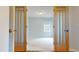 Bright bedroom with carpeted floors and a window at 7607 Divot Dr, Sanford, NC 27332