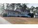 Two-story house with a landscaped yard at 7607 Divot Dr, Sanford, NC 27332