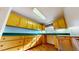 Kitchen with light wood cabinets and green countertops at 7607 Divot Dr, Sanford, NC 27332