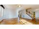 Spacious living room with hardwood floors and lots of natural light at 7607 Divot Dr, Sanford, NC 27332
