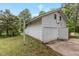 Spacious detached garage with a basketball hoop, providing ample storage and recreational space at 801 Williamsboro St, Oxford, NC 27565