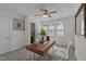 Bright office with a modern desk, ceiling fan, and neutral decor at 801 Williamsboro St, Oxford, NC 27565