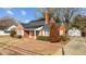 Brick house with solar panels and brick driveway at 801 Williamsboro St, Oxford, NC 27565