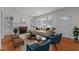 Cozy living room with a fireplace, built-in bookshelves, and plenty of natural light at 801 Williamsboro St, Oxford, NC 27565