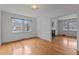 Inviting living room with hardwood floors, a fireplace, and ample natural light at 801 Williamsboro St, Oxford, NC 27565