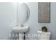 Modern bathroom with double vanity and walk-in shower at 71 Priming Way, Angier, NC 27501