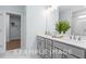 Elegant bathroom with double sinks and large mirror at 71 Priming Way, Angier, NC 27501