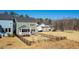 Aerial view of a house with backyard and playset at 101 Copper Leaf Ave, Chapel Hill, NC 27516