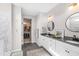 Large bathroom with double vanity and walk in closet access at 101 Copper Leaf Ave, Chapel Hill, NC 27516