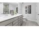 Double vanity bathroom with gray cabinets and a modern design at 1013 Freestone Rd, Durham, NC 27703