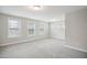 Bright bedroom with neutral walls and plush carpeting at 1015 Rexburg Dr, Cary, NC 27513