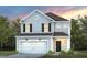 Two-story house with gray siding, white garage door, and landscaping at 1110 Freestone Rd, Durham, NC 27703