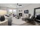 Relaxing living room with fireplace, comfy seating, and a large mirror at 1110 Freestone Rd, Durham, NC 27703