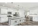 Modern kitchen featuring granite countertops, stainless steel appliances, and a wine cooler at 1111 Freestone Rd, Durham, NC 27703