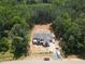 New construction modern farmhouse with covered porch nestled on a wooded lot at 1236 Perry Bluff Dr, Wake Forest, NC 27587