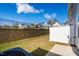 Private backyard with a small patio and fence at 1267 Willow Tree Way, Graham, NC 27253