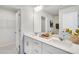 Double vanity bathroom with white cabinets and quartz countertops at 1267 Willow Tree Way, Graham, NC 27253