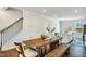 Modern farmhouse dining area with wood table and bench at 1267 Willow Tree Way, Graham, NC 27253