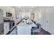 Modern kitchen with island, stainless steel appliances, and open layout at 1267 Willow Tree Way, Graham, NC 27253