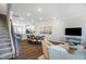 Open living area with hardwood floors and kitchen views at 1267 Willow Tree Way, Graham, NC 27253