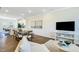 Open living space with hardwood floors and kitchen at 1267 Willow Tree Way, Graham, NC 27253