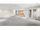 Spacious basement recreation room with wet bar and carpeting at 1313 Enderbury Dr, Raleigh, NC 27614