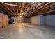 Unfinished basement with high ceilings and concrete floor at 1313 Enderbury Dr, Raleigh, NC 27614