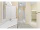 Bright bathroom boasts a vanity, shower, and walk-in closet at 1313 Enderbury Dr, Raleigh, NC 27614