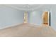 Spacious bedroom with carpeted floor and access to bathroom and walk-in closet at 1313 Enderbury Dr, Raleigh, NC 27614