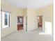 Spacious bedroom with plush carpeting and access to a private bath at 1313 Enderbury Dr, Raleigh, NC 27614